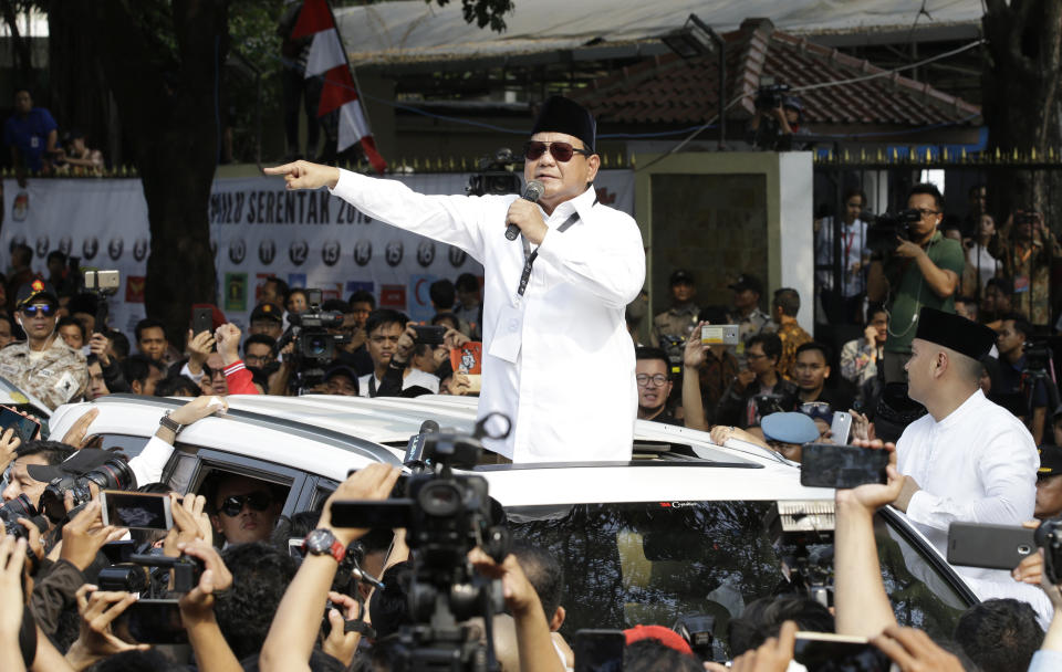 Indonesian presidential candidate Prabowo Subianto, center, speaks to his supporters after formal registration as candidate for the 2019 presidential election in Jakarta, Indonesia. Friday, Aug. 10, 2018. He is running with businessman and deputy Jakarta governor Sandiaga Salahuddin Uno. Both officially registered as candidates after Friday prayers. (AP Photo/Achmad Ibrahim))