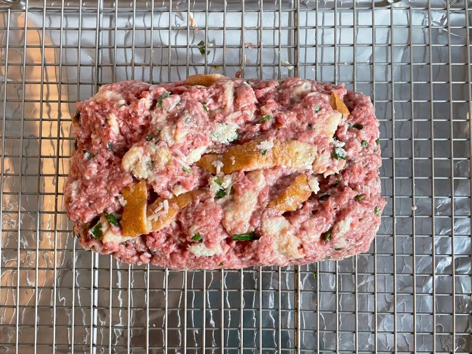 Meat loaf on a grated sheet.