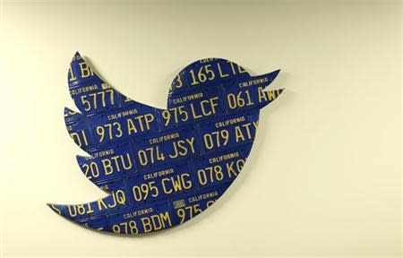 A Twitter logo made from Californian license plates is shown at the company's headquarters in San Francisco, California October 4, 2013. REUTERS/Robert Galbraith