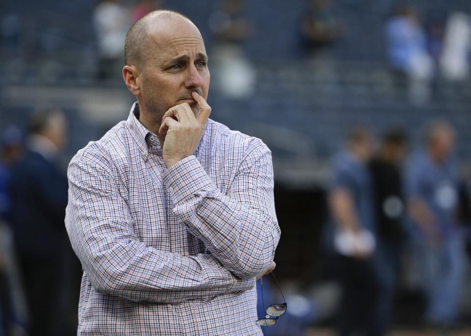 Brian Cashman and the Yankees find themselves as sellers for the first time since 1989. (AP)