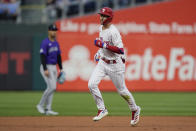 Philadelphia Phillies' Trea Turner runs the bases on a home run off Colorado Rockies pitcher Ryan Feltner during the first inning of a baseball game Wednesday, April 17, 2024, in Philadelphia. (AP Photo/Matt Rourke)