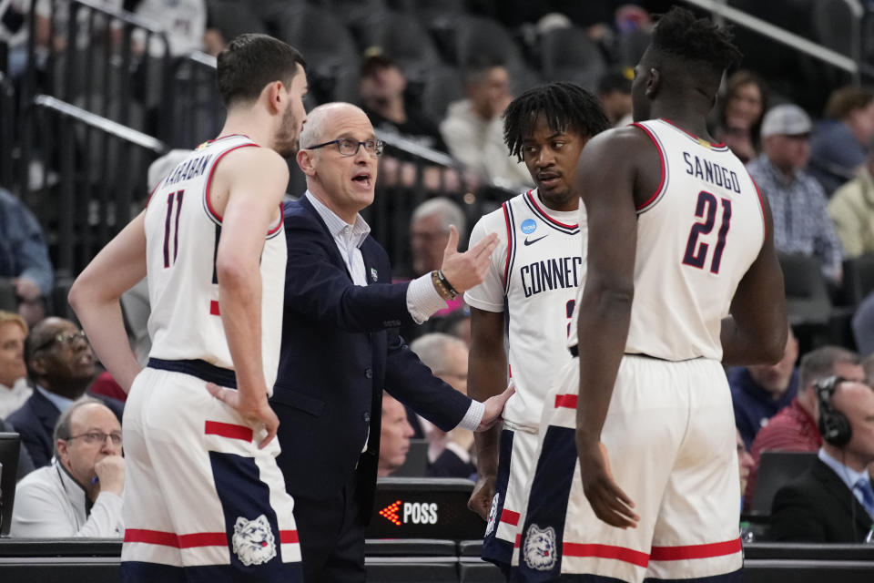 UConn head coach Dan Hurley speaks with his team in the first half of a Sweet 16 college basketball game against the Arkansas Razorbacks in the West Regional of the NCAA Tournament, Thursday, March 23, 2023, in Las Vegas. (AP Photo/John Locher)