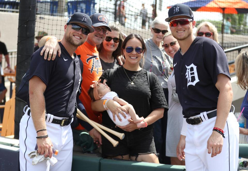 Tigers outfielders Austin Meadows, left, and his brother Parker Meadows, right, with family members before the spring training game against the Phillies on Saturday, Feb. 25, 2023. The two brothers started together in the outfield.