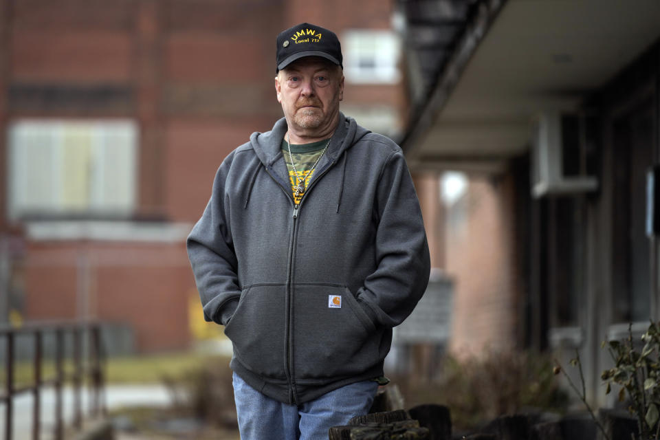 Frank "Rusty" Brown poses for a picture at the union office, across the street from the Remington Arms Co. compound, in Ilion, N.Y., Thursday, Feb. 1, 2024. (AP Photo/Seth Wenig)