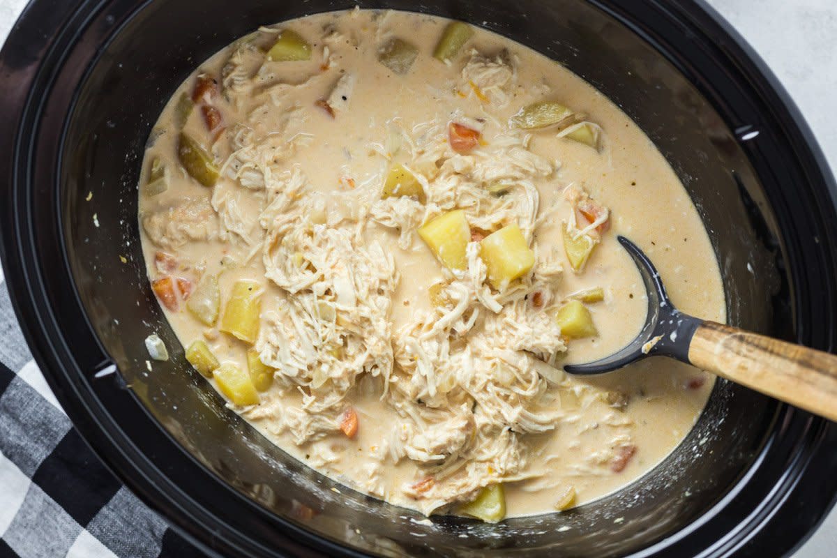 <p>The Magical Slow Cooker</p><p>Potato and chicken soup that is flavored with buffalo wing sauce! You won't believe the flavor of this recipe!</p><p><strong>Get the Recipe: <a href="https://www.themagicalslowcooker.com/slow-cooker-buffalo-chicken-soup/" rel="nofollow noopener" target="_blank" data-ylk="slk:Crock Pot Buffalo Chicken Soup;elm:context_link;itc:0;sec:content-canvas" class="link rapid-noclick-resp">Crock Pot Buffalo Chicken Soup</a></strong></p>