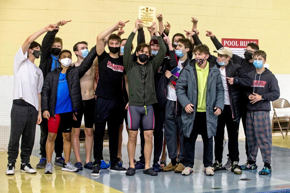 Fairview High School celebrates their first place team win on Saturday at the 38th Iroquois Coaches Association Boys Swimming Invitational at Iroquois Junior Senior High School in Lawrence Park Township.