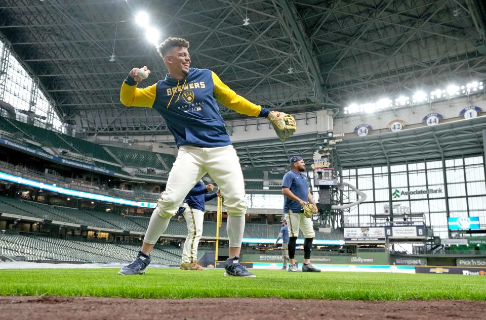 Milwaukee Brewers shortstop Willy Adames (27) has a laugh while playing catch next to first baseman Rowdy Tellez (11) during a workout at American Family Field in Milwaukee on Wednesday, April 6, 2022.  

Photo by Mike De Sisti / The Milwaukee Journal Sentinel