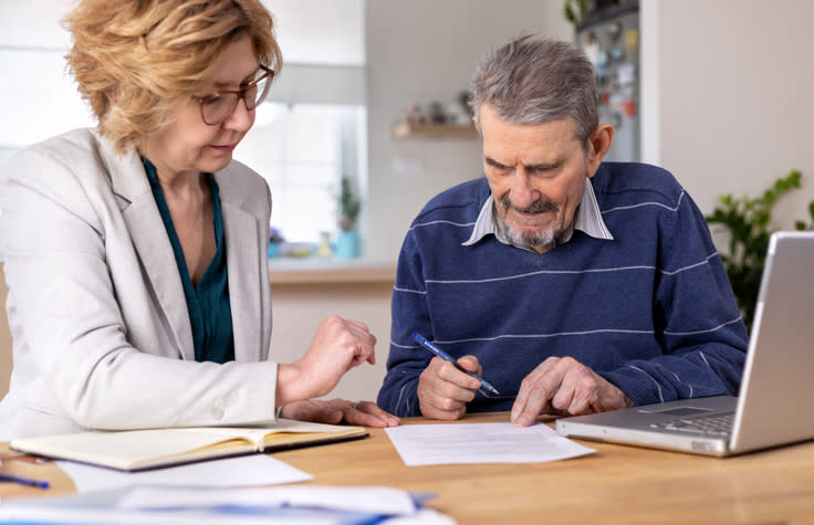 A senior preparing a power of attorney with a financial advisor in Texas.