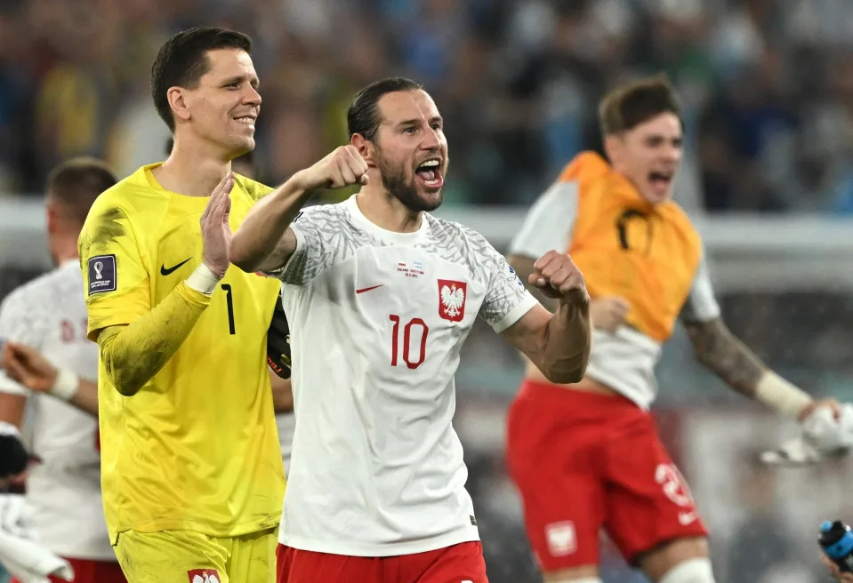 Soccer Football - FIFA World Cup Qatar 2022 - Group C - Poland v Argentina - Stadium 974, Doha, Qatar - November 30, 2022 Poland's Grzegorz Krychowiak celebrates after the match as Poland qualify for the knockout stages REUTERS/Dylan Martinez