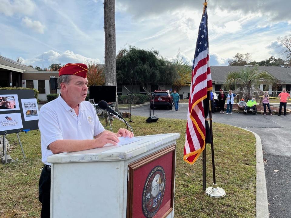The late Jack Edge's son, Dale, speaks Tuesday during the Pearl Harbor remembrance ceremony in Ocala.