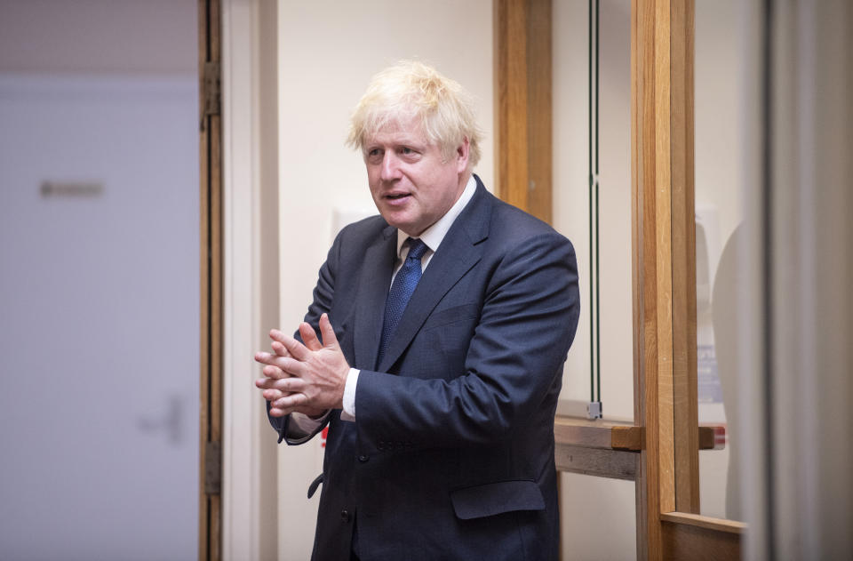 Prime Minister Boris Johnson sanitises his hands during his visit to St Joseph's Catholic Primary School in Upminster, east London, to see work to make schools safe for return in September.