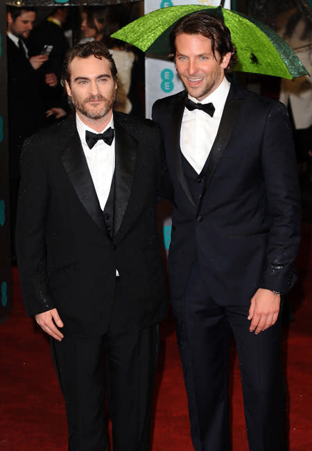 <p>What's a little bit of rain and snow to Best Actor BAFTA nominees Joaquin Phoenix (L) and Bradley Cooper? Their wet suits didn't seem to dampen the gents' BAFTA enthusiasm.</p>