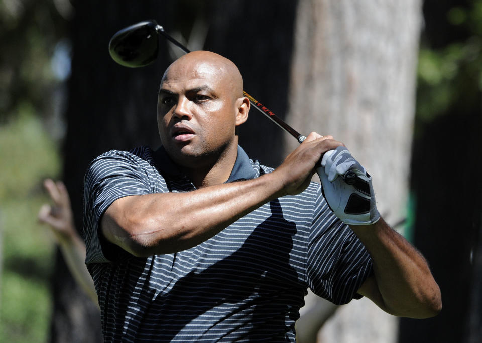 Charles Barkley tees off on the eighth hole during the 20th annual Lake Tahoe Celebrity Golf Championship at Edgewood Tahoe Golf Club in Stateline, Nev., Thursday, July 16, 2009. The celebrity golf championship is celebrating its 20th anniversary. (AP Photo/Reno Gazette-Journal, David B. Parker) ** NEVADA APPEAL OUT. **