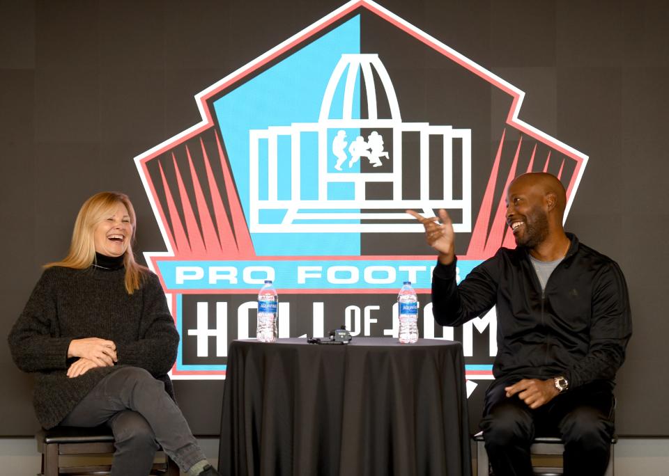 Mindy Coryell Lewis, the daughter of Class of 2023 enshrinee Don Coryell and Ken Riley II, son of 2023 enshrinee Ken Riley, answer a question at the Pro Football Hall of Fame, Monday, March 6, 2023.