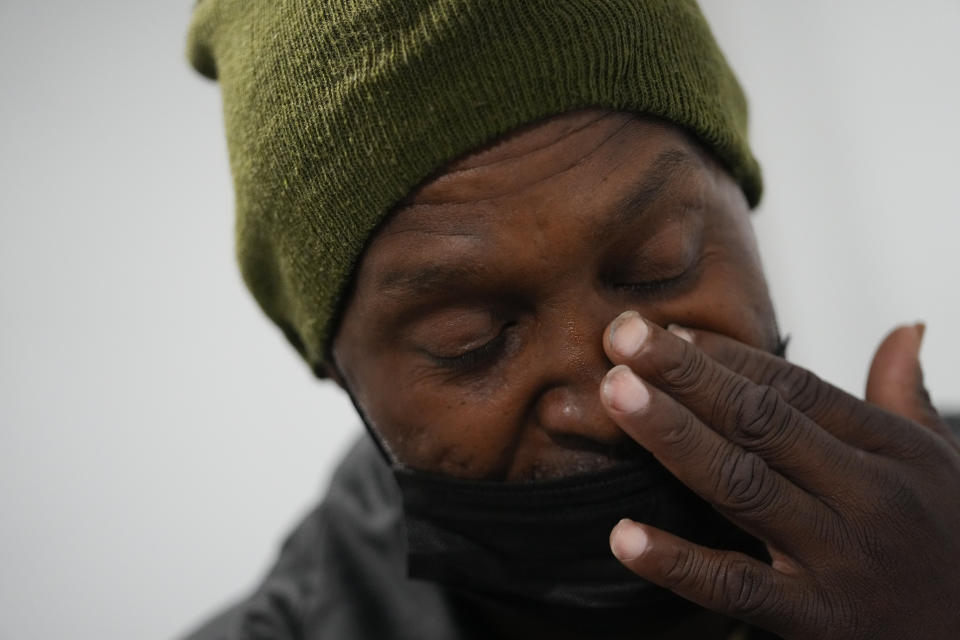 Marc Floyd, 54, reacts during a session with nurse practitioner Bobby Harris inside a Baltimore City Health Department RV, Monday, March 20, 2023, in Baltimore. The Baltimore City Health Department's harm reduction program uses the RV to address the opioid crisis, which includes expanding access to medication assisted treatment by deploying a team of medical staff to neighborhoods with high rates of substance abuse and offering buprenorphine prescriptions. (AP Photo/Julio Cortez)