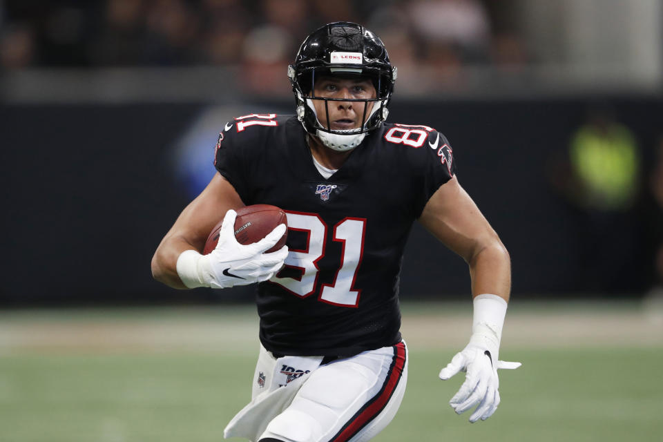 FILE - In this Sept. 29, 2019, file photo, Atlanta Falcons tight end Austin Hooper (81) runs against the Tennessee Titans during the first half of an NFL football game in Atlanta. The Browns are working toward a deal with two-time Pro Bowl free agent tight end Austin Hooper, a person familiar with the negotiations told The Associated Press. Hooper was one of the main free agency targets for Cleveland, said the person who spoke on condition of anonymity because teams can’t officially announce deals until Wednesday, Marcg 18, 2020.(AP Photo/John Bazemore, File)