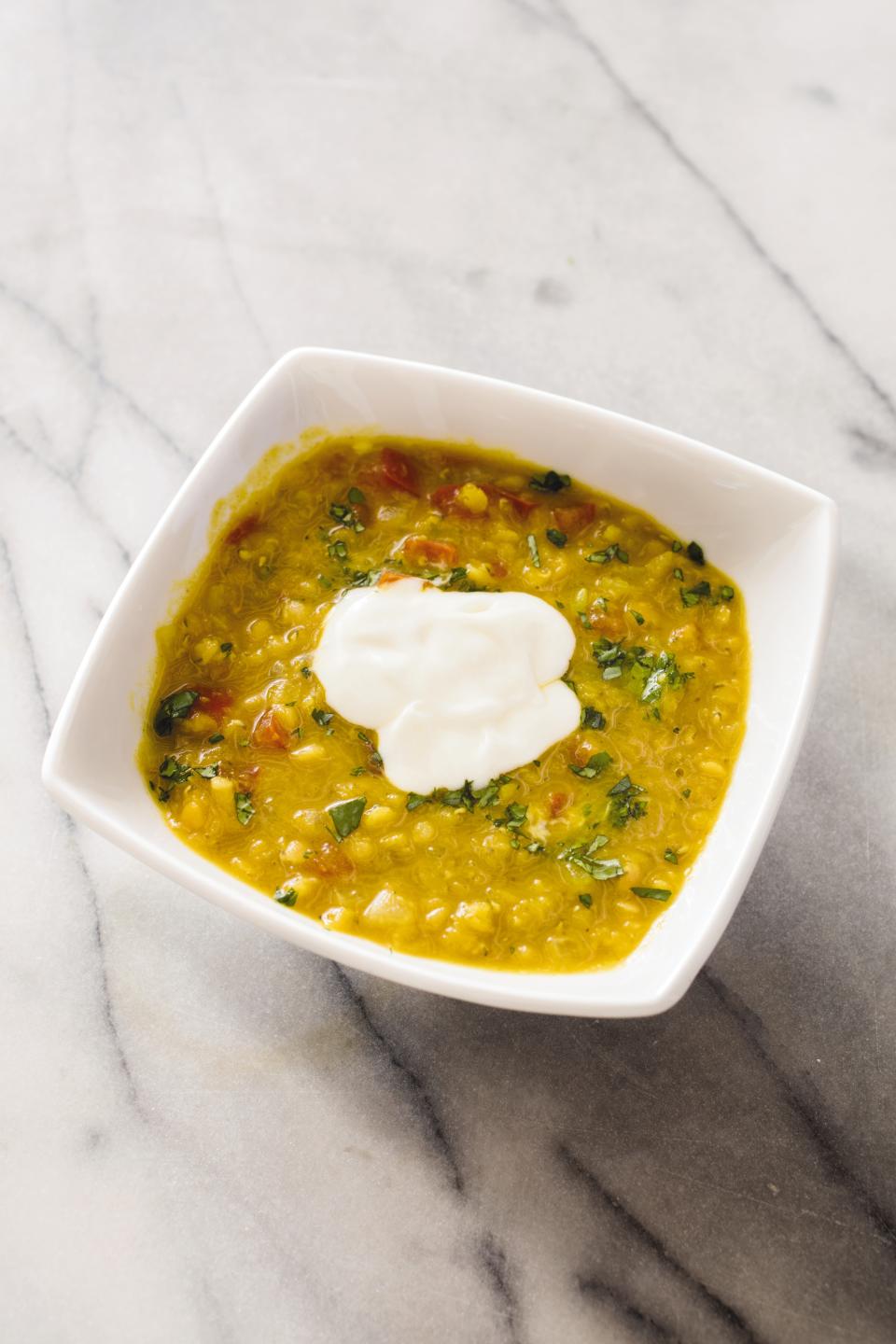 This undated photo provided by America's Test Kitchen in September 2018 shows curried red lentil soup in Brookline, Mass. This recipe appears in the cookbook “All-Time Best Soups.” (Daniel J. van Ackere/America's Test Kitchen via AP)