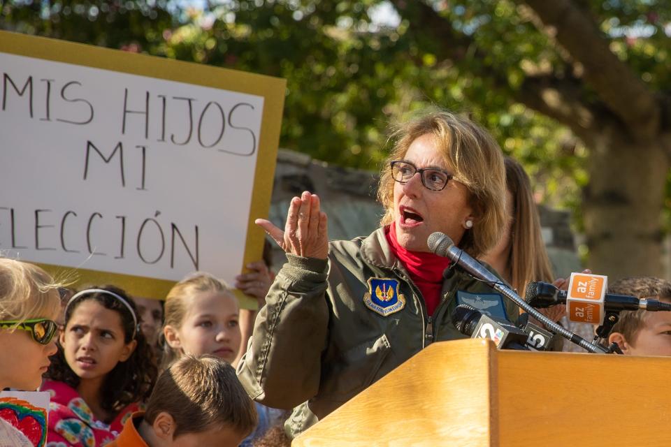 Senator Wendy Rogers speaks at a protest at the Rose Garden outside the Arizona state Capitol in Phoenix on Jan. 17, 2023.