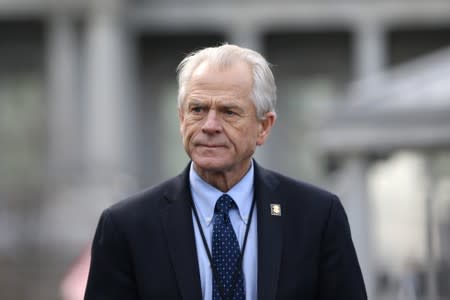White House trade adviser Peter Navarro listens to a news conference outside of the West Wing of the White House