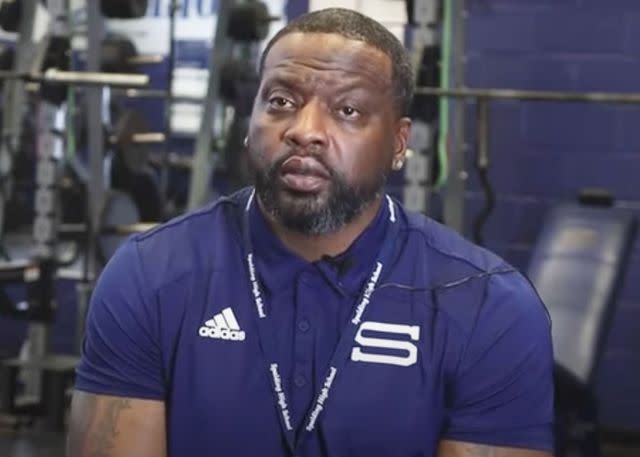 <p>Griffin Spalding County Schools</p> Carl Dennis Kearney, Jr. in 2022 in the Spalding High School weight room, where he worked as a head coach starting in 2020.