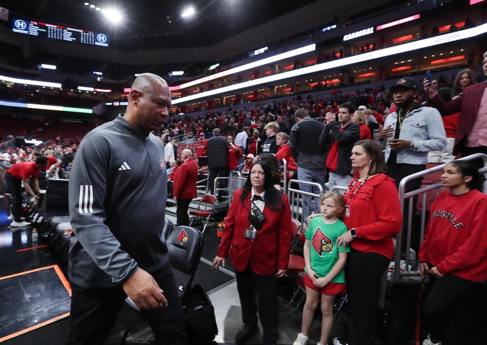 Louisville coach Kenny Payne walks off the court after the Cardinals' 67-61 loss to Boston College on Saturday night.