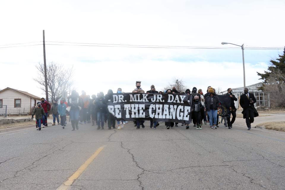 About 200 people gathered to make the one mile walk from New Hope Baptist Church to Bones Hooks Park to honor Martin Luther King Jr. on Martin Luther King Jr. Day in a previous year. [Neil Starkey / For the Amarillo Globe-News]