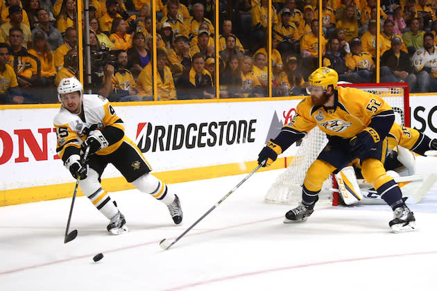 NASHVILLE, TN – JUNE 05: Josh Archibald #45 of the Pittsburgh Penguins is defended by Matt Irwin #52 of the Nashville Predators during the first period of Game Four of the 2017 NHL Stanley Cup Final at the Bridgestone Arena on June 5, 2017 in Nashville, Tennessee. (Photo by Frederick Breedon/Getty Images)