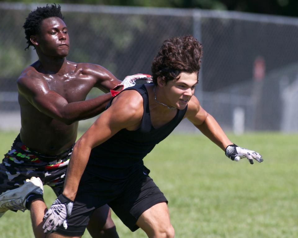 Lincoln football players participate in spring practice on June 22, 2022, at Lincoln High School.