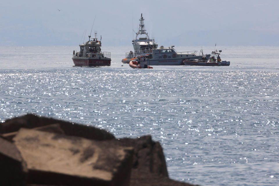 Emergency services work near the scene where a sailboat sank in the early hours of Monday off the coast of Porticello, near the Sicilian city of Palermo, Italy, August 19, 2024. REUTERS/Igor Petyx