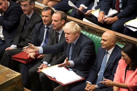 Britain's Prime Minister Boris Johnson gestures during PMQs session in the House of Commons in London