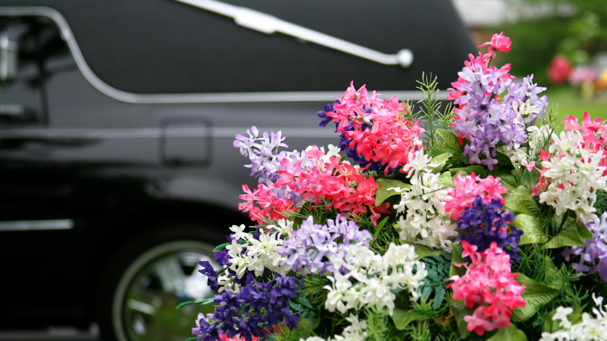 Hearse and flowers
