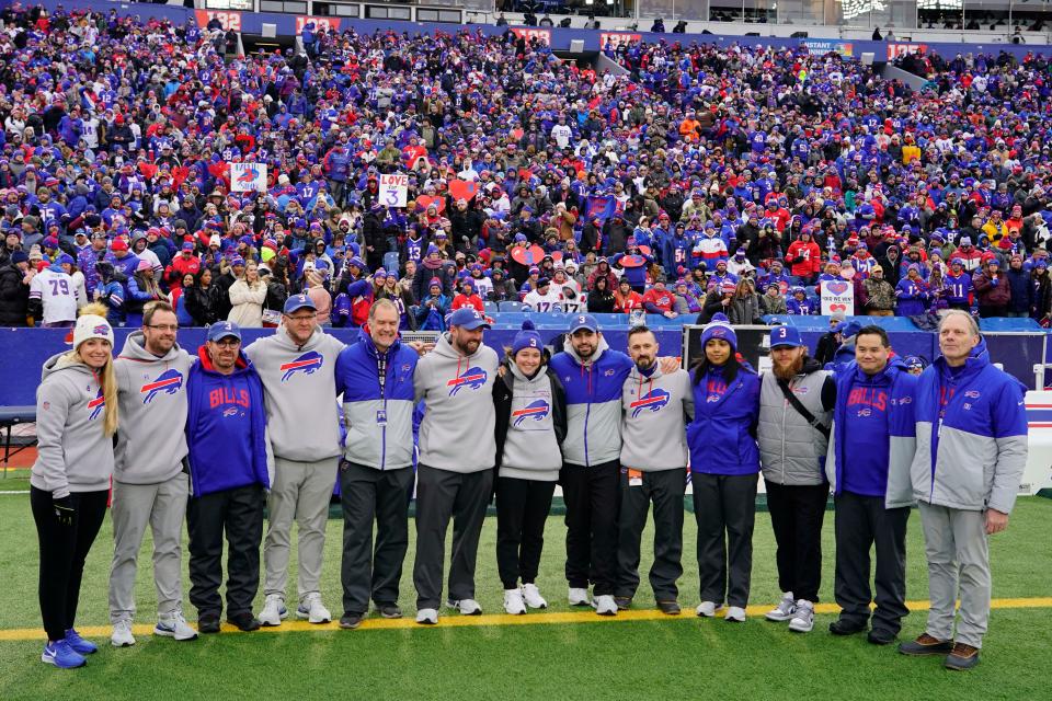 The Buffalo Bills training staff is recognized prior to the game against the New England Patriots at Highmark Stadium. The staff will be honored with the Pat Tillman Award for Service at 2023 ESPYS.