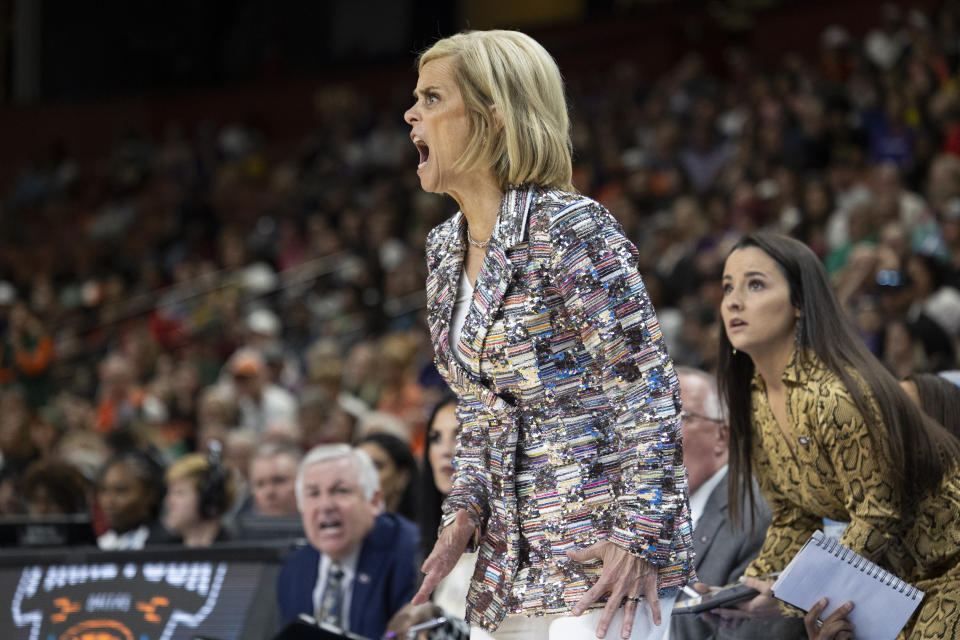 LSU head coach Kim Mulkey yells during the first half of an Elite 8 college basketball game against Miami in the NCAA Tournament in Greenville, S.C., Sunday, March 26, 2023. (AP Photo/Mic Smith)