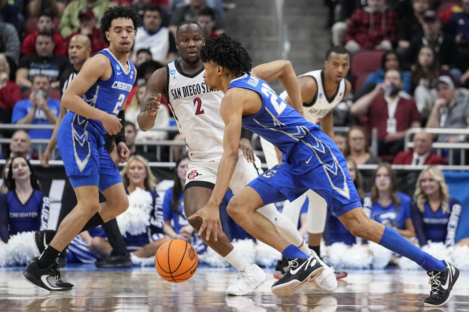 Creighton guard Devin Davis (22) moves the ball against San Diego State in the second half of a Elite 8 college basketball game in the South Regional of the NCAA Tournament, Sunday, March 26, 2023, in Louisville, Ky. (AP Photo/John Bazemore)