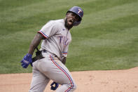 Texas Rangers' Adolis Garcia celebrates his three-run home run during the eighth inning of a baseball game against the Los Angeles Angels, Wednesday, April 21, 2021, in Anaheim, Calif. (AP Photo/Jae C. Hong)