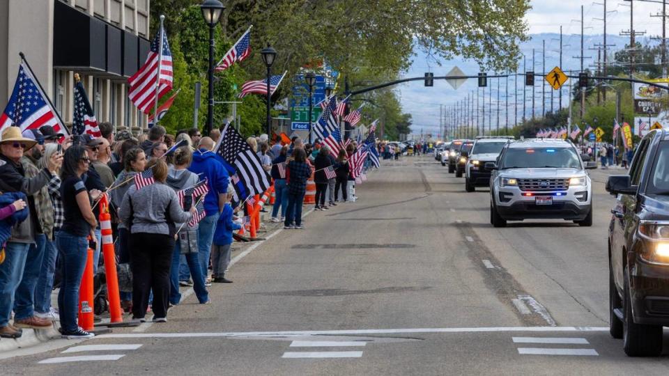 A two-hour long procession of law enforcement vehicles escorts the late Tobin Bolter, an Ada County sheriff’s deputy who was killed in the line of duty, through Star on the way to a funeral held at the Ford Idaho Center on Tuesday.