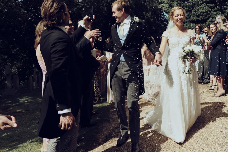 I loved this moment, we were showered with confetti as we walked down to the car.