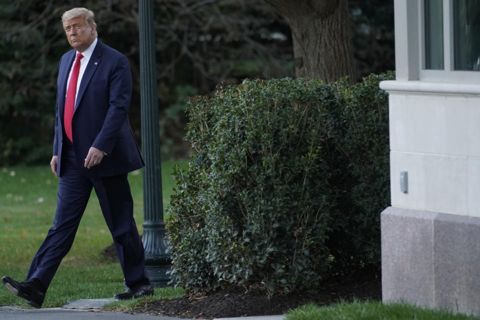 President Donald Trump walks to board Marine One at the White House in Washington, Tuesday, Oct. 20, 2020, for a short trip to Andrews Air Force Base, Md., and then on to Erie, Pa. for a campaign rally. (AP Photo/Andrew Harnik)