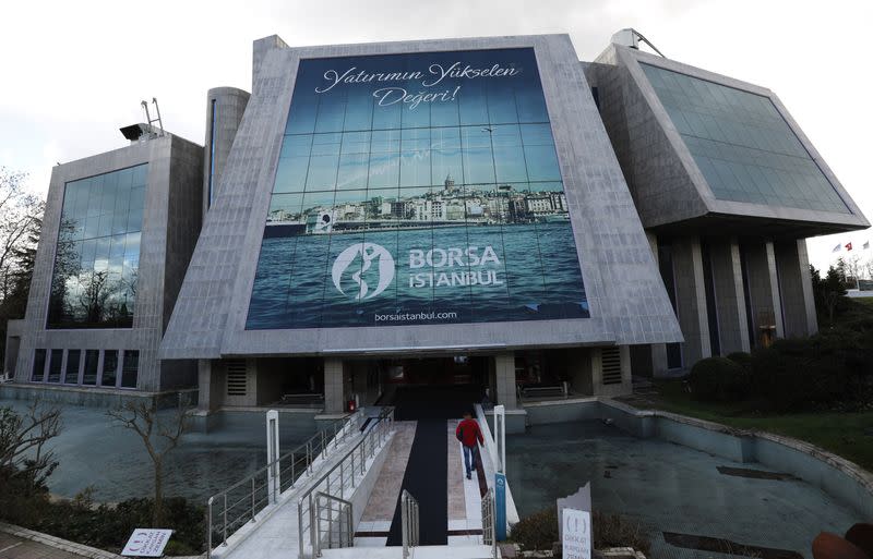 FILE PHOTO: A man enters the Bourse Istanbul in Istanbul