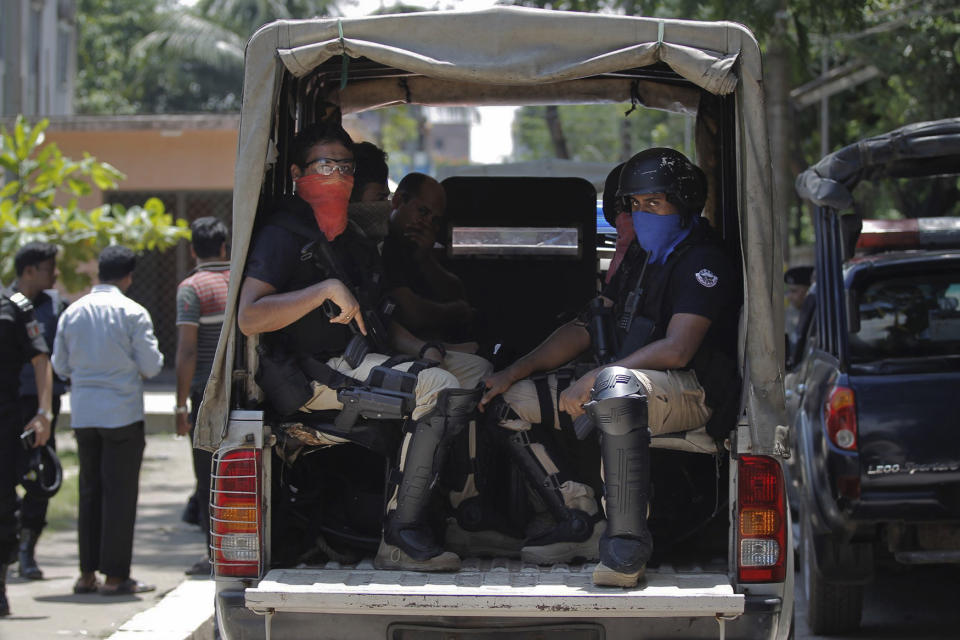 <p>Bangladeshi security police leave from a shooting scene in Narayanganj, outskirts of Dhaka, Saturday, Aug. 27, 2016. (AP Photo) </p>