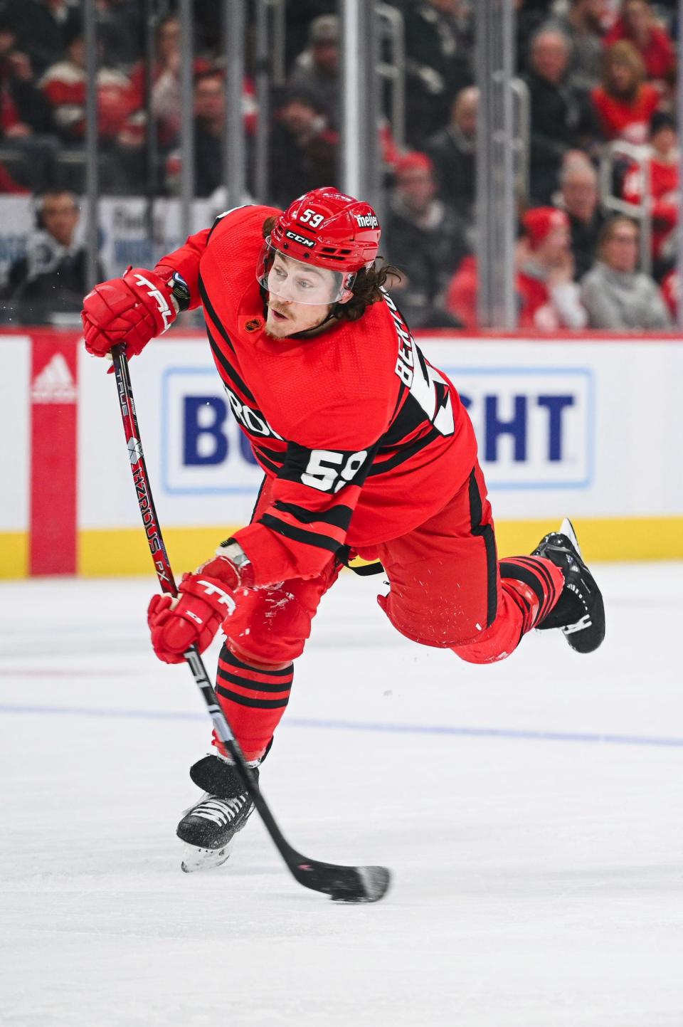 Detroit Red Wings left wing Tyler Bertuzzi (59) shoots during the second period against the Vancouver Canucks at Little Caesars Arena in Detroit on Saturday, Feb. 11, 2023.