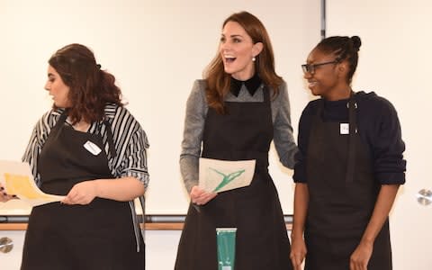 Kate tries her land at lino cutting - Credit: Eddie Mulholland