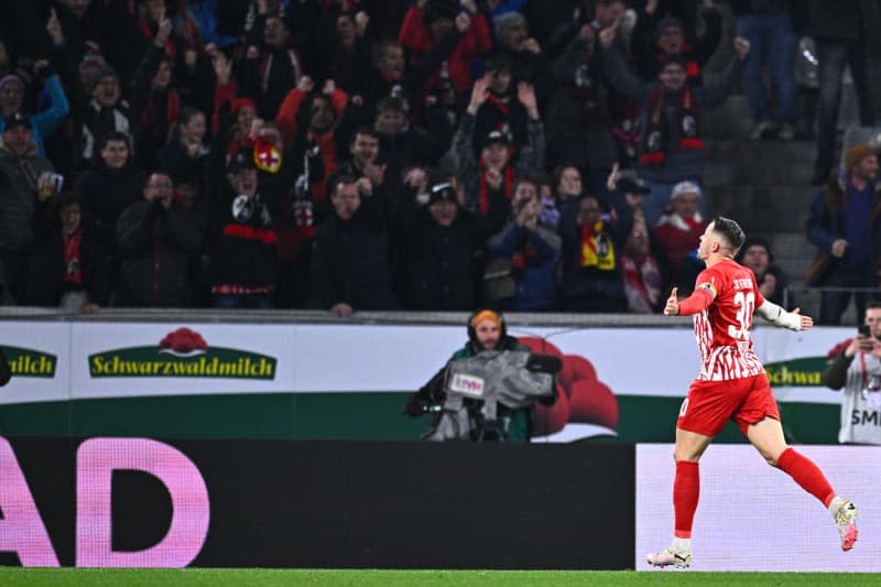 Freiburg's Christian Guenter celebrates scoring his side's first goal during the German Bundesliga soccer match between SC Freiburg and Bayern Munich at Europa-Park Stadium. Tom Weller/dpa