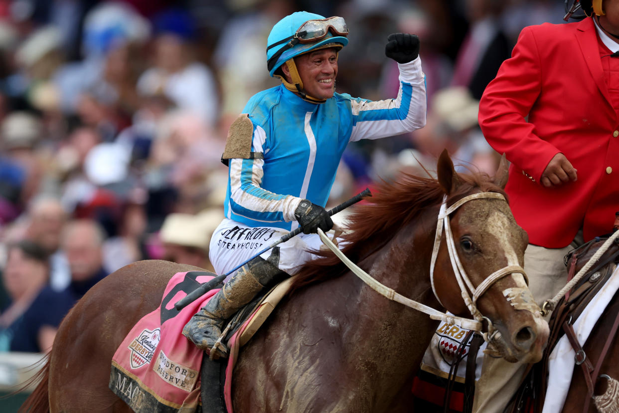 LOUISVILLE, KENTUCKY - MAY 06: Jockey Javier Castellano celebrates atop of Mage #8 after winning t the 149th Kentucky Derby at Churchill Downs on May 06, 2023 in Louisville, Kentucky. (Photo by Rob Carr/Getty Images)