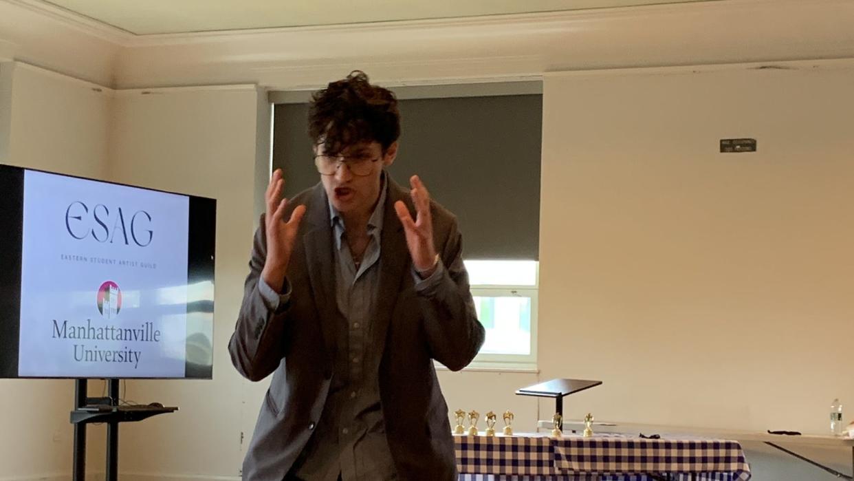 Aron Tucker of The Masters School performs a monologue from "Biloxi Blues" at the inaugural Eastern Student Artist Guild award ceremony at Manhattanville University on May 4, 2024. The awards honored work by students on plays without music across the Lower Hudson Valley.