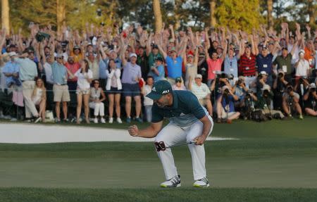 Sergio Garcia of Spain celebrates winning the Masters with a putt on the 18th green during a playoff against Justin Rose of England in the final round of the 2017 Masters golf tournament at Augusta National Golf Club in Augusta, Georgia, U.S., April 9, 2017. REUTERS/Mike Segar