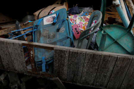 Belongings are seen among rubble in Balaroa neighbourhood hit by an earthquake and ground liquefaction in Palu, Central Sulawesi, Indonesia, October 7, 2018. REUTERS/Jorge Silva