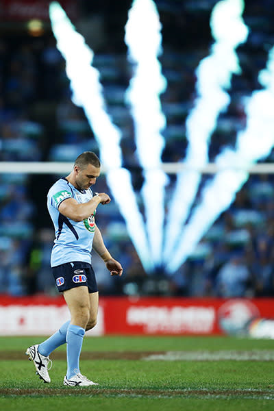 NSW skipper Robbie Farah takes the field