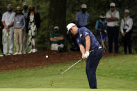 Sungjae Im, of South Korea, chips to the sixth green during the final round of the Masters golf tournament Sunday, Nov. 15, 2020, in Augusta, Ga. (AP Photo/Matt Slocum)