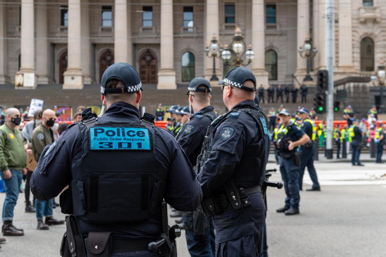 <span>Police keep protesters and counter-protesters separate during an anti-trans rights protest outside Victorian parliament on Saturday.</span><span>Photograph: Michael Currie/Sopa Images/Rex/Shutterstock</span>